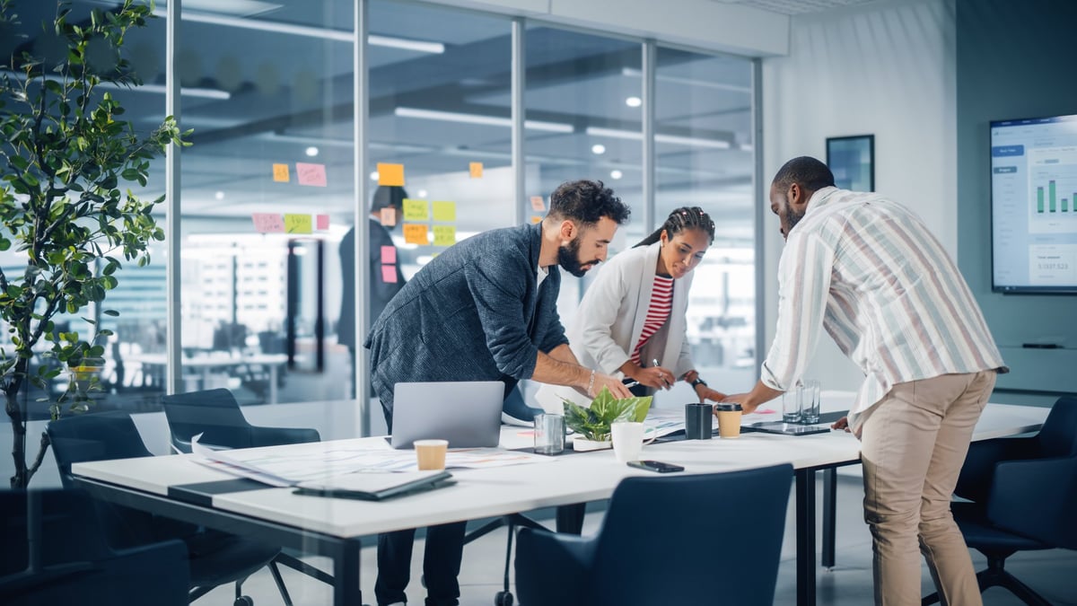 Diverse team of professional businesspeople meeting in office conference room